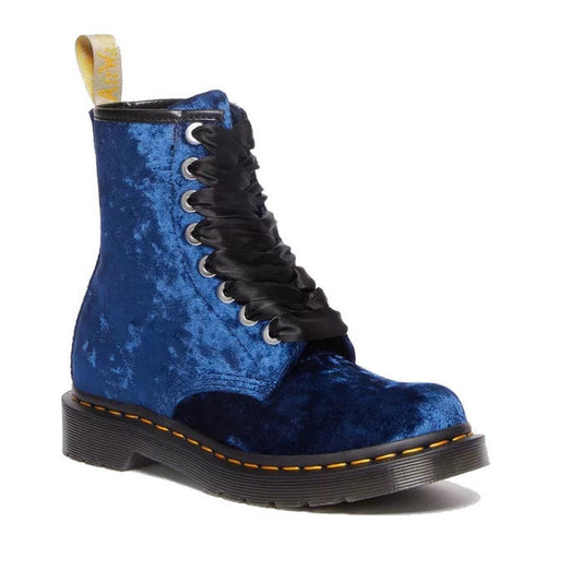 Image of right foot, side on of Dr Martens 1460 Vegan Blue Crushed Velvet 8 Eye Boot-Foot Forward Shoes