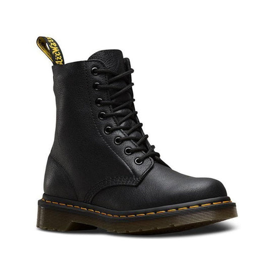 Side on view of the Dr Marten Pascal 1460 viginia leather boot in black. softer slightly textured pebbled leather leather and a womens width. Showing the heel loop pill tab, 8 eye black laces, yellow stitchig around the sole and classic brownslightly tran