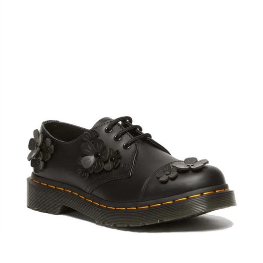 Dr Martens 1461 Flower 3 Eye Oxford Shoe in classic black boasts a sturdy sole, easy lace-up, and cute floral details kids love.  ksnz