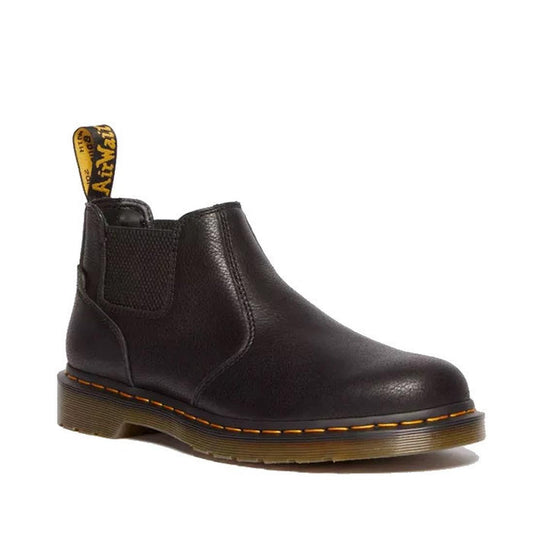 A black Dr Martens 2976 Crop Chelsea Boot with a crop top design, a lower height of other 2976 Dr Martens chelsea boots, featuring yellow stitching and a pull tab on the heel.
