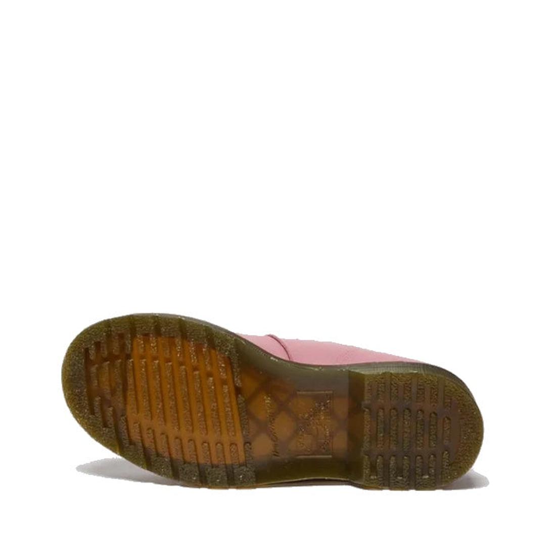 A Dr Martens 8065 2 Strap Mary Jane Shoe in Dusky Rose Pink is shown on its side, highlighting its brown translucent textured sole against a white background., 50241, 50242, 50243, 50244, 50245, 50246, 50247, 50241, 190665781861, 190665781878, 19066578189