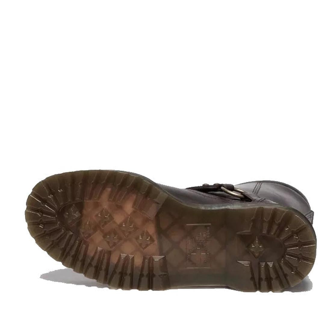 A Dr Martens Anistone Harness Bex Crazy Dark Brown Horse Biker Boot lies on its side, sole up, showcasing its deep-tread, textured rubber outsole against a white background. Made from rich Crazy Horse leather., 49399, 190665745689, 190665745696, 190665745