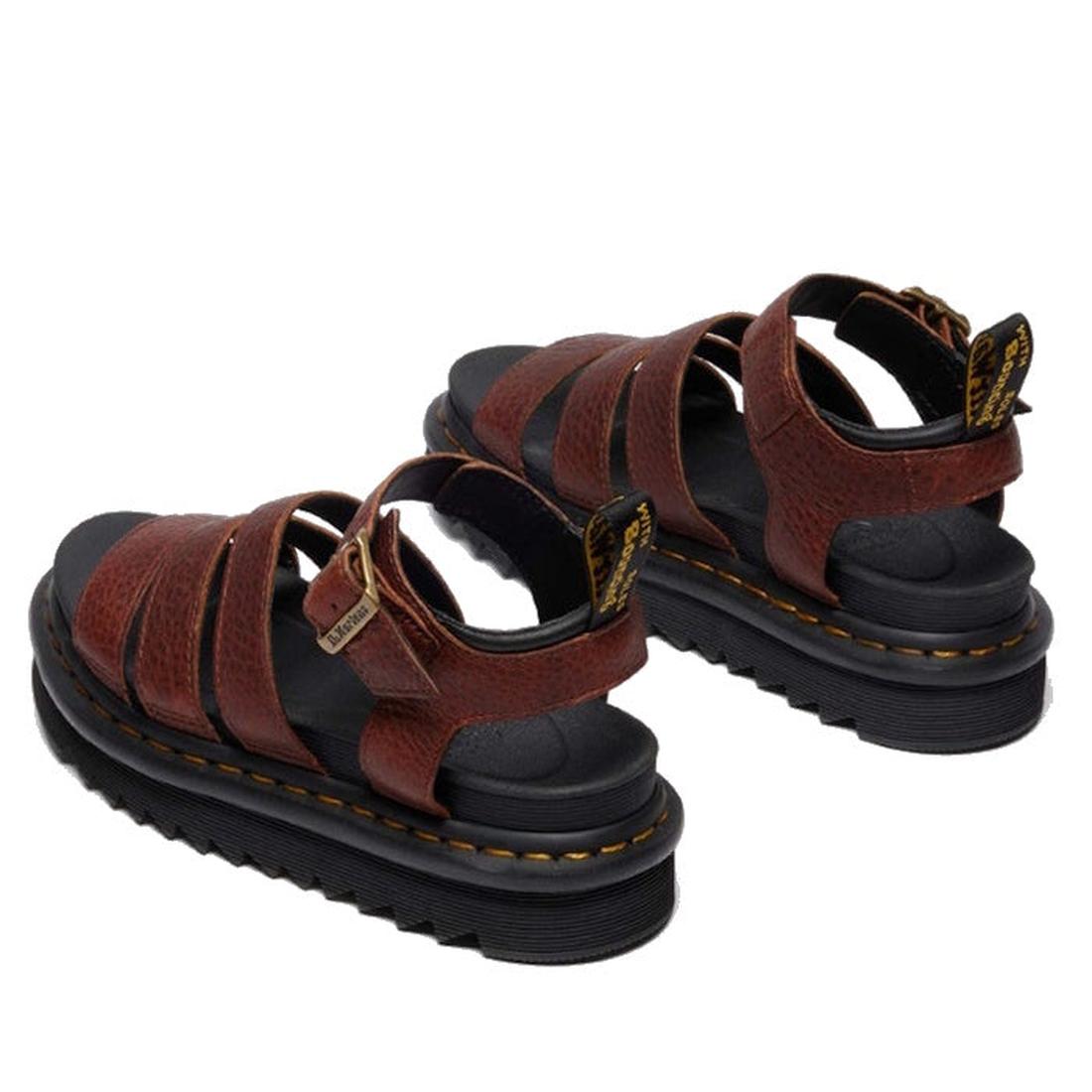 The Dr Martens 3 Strap Blaire Sandal in Cashew Ambassador Leather Tan features thick black cushioned soles, adjustable straps, yellow stitching accents, a branded heel loop, and is inspired by the classic Blaire sandal., 190665772005, 190665772012, 190665