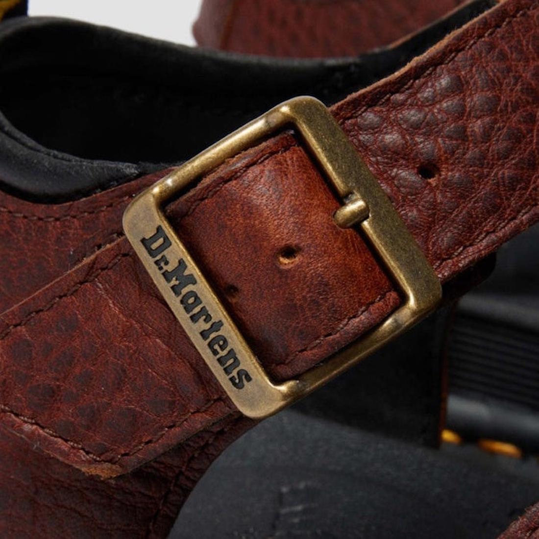 Close-up of the Dr Martens 3 Strap Blaire Sandal in Cashew Ambassador Leather Tan with a brass buckle engraved with Dr. Martens, textured finish, black lining, and lightweight comfort., 190665772005, 190665772012, 190665772029, 190665772043, 190665772050,