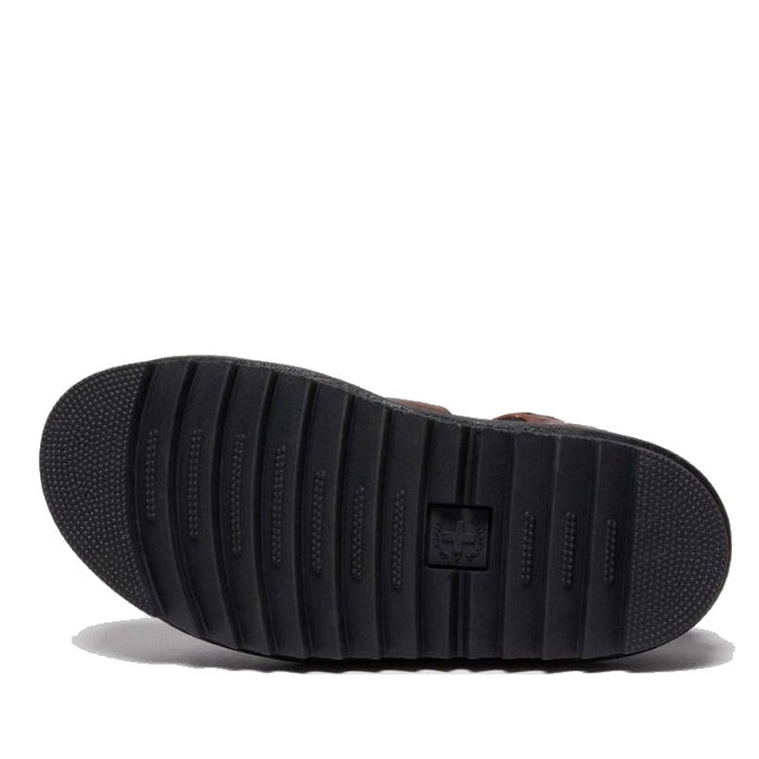 The image shows the bottom view of a black rubber sole with horizontal grooves for traction and a small embossed logo, typical of the Dr Martens 3 Strap Blaire Sandal in Cashew Ambassador Leather Tan, against a plain white background., 190665772005, 19066