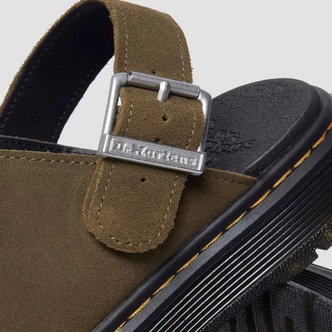 Close-up of the Dr Martens Brookline Suede Mule Clog Sandal in olive, featuring an engraved silver buckle, yellow stitching, black textured lightweight sole, and signature Brookline-inspired style., 44833, 190665705867, 190665705874, 190665705881, 1906657