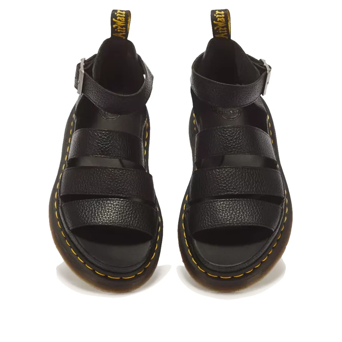 Dr Martens Clarissa II Quad Platform Sandal in black Milled Nappa leather, featuring buckled ankle straps and yellow welt stitching.