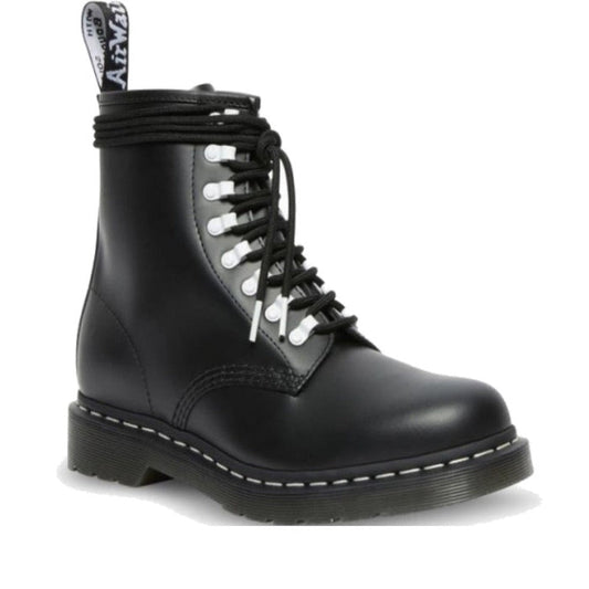 Image of right foot, side on of Dr Martens 1460 Disrupt Hardware 8 eye Boot Black White-Foot Forward Shoes