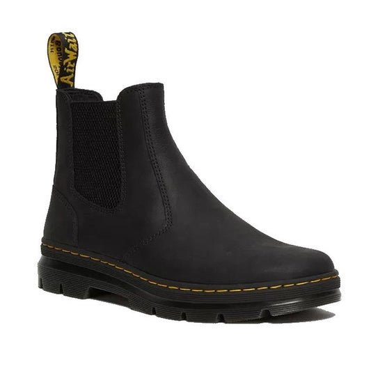Dr Martens Embury Chelsea Boot in black, with easy pull tab, elastic sides, thick sole, yellow stitching, and smooth finish.  ksnz