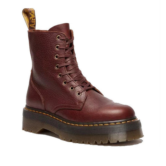 A single Dr Martens Jadon Cashew Tan Ambassador Leather Zip Boot with a chunky platform sole, ridged black tread, yellow stitching, and a back pull tab featuring text.
