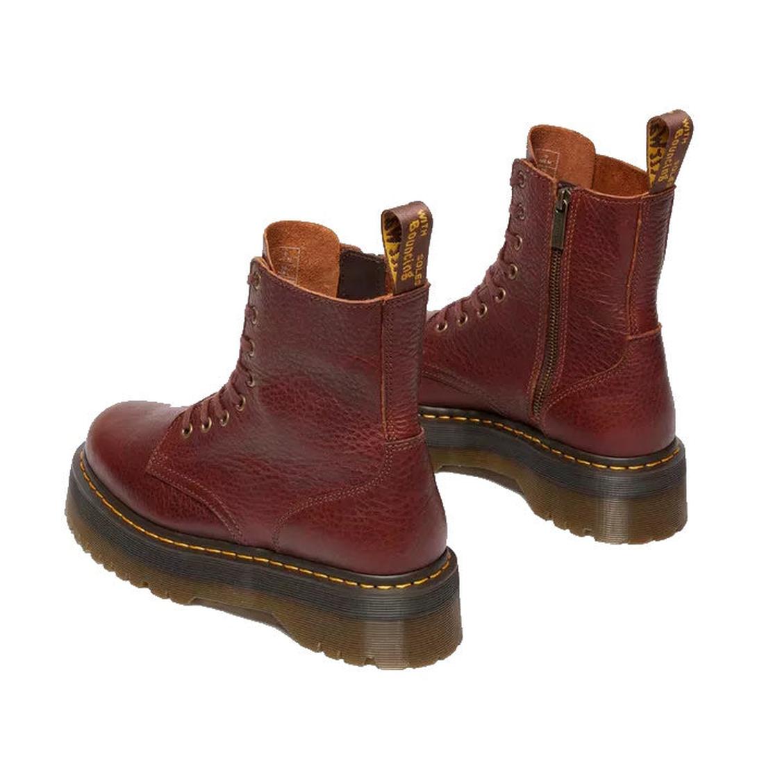 A pair of Dr Martens Jadon Cashew Tan Ambassador Leather Zip Boots, featuring thick brown platform soles, yellow stitching, side zippers, and back pull tabs—an elevated twist on the classic Jadon style., 190665749038, 190665749045, 190665749052, 190665749