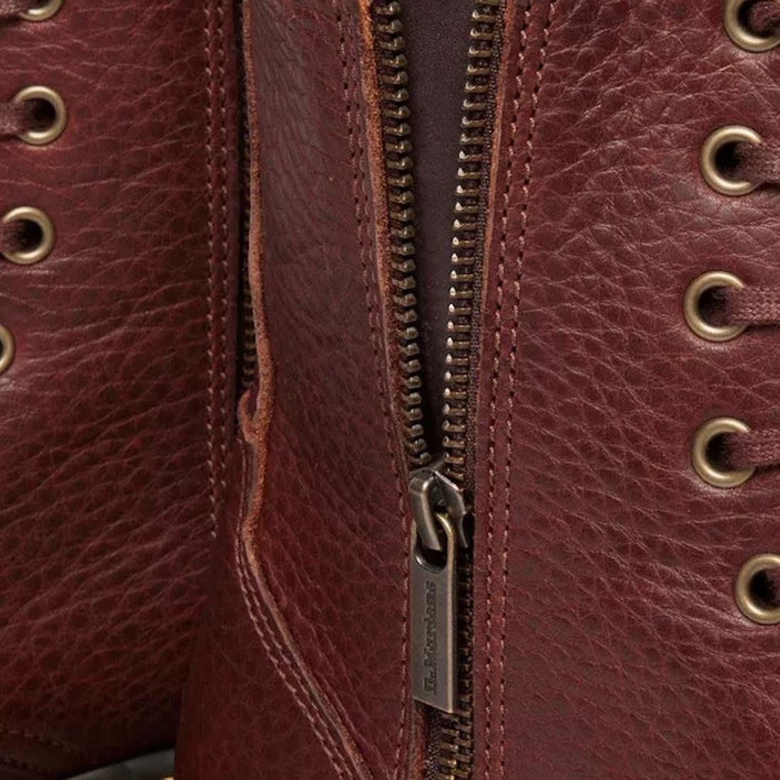Close-up of the Dr Martens Jadon Cashew Tan Ambassador Leather Zip Boot, highlighting its textured grain, metal eyelets, detailed stitching, side zipper, and chunky platform sole., 190665749038, 190665749045, 190665749052, 190665749076, 190665749083, 1906