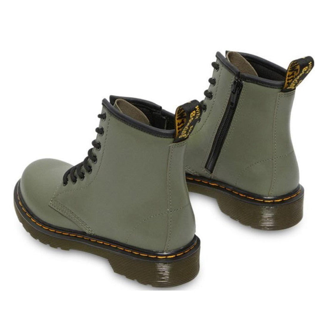 A pair of Dr Martens kids 1460 J Juniors Leather Boot w/zip in khaki, featuring black soles, yellow stitching, black side zippers, and branded black pull tabs. The Goodyear-welted boots are shown angled to display the front and back., 27368, 27369, 190665