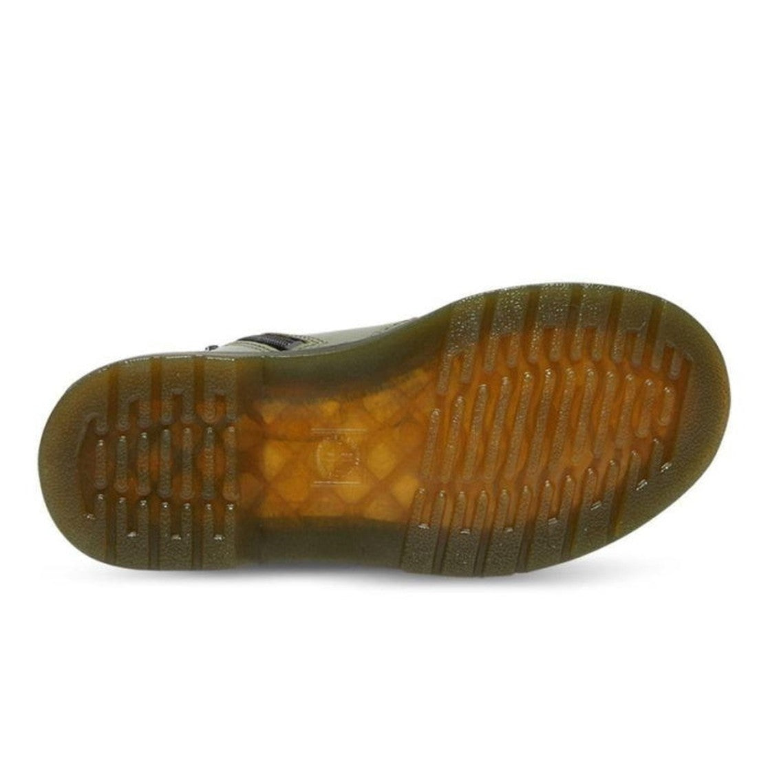 The image shows the sole of the Dr. Martens kids - 1460 J Juniors Leather Boot w/zip Khaki, featuring translucent amber rubber with a ridged tread, multiple horizontal grooves, a textured surface, and Goodyear-welted construction for durability., 27368, 2