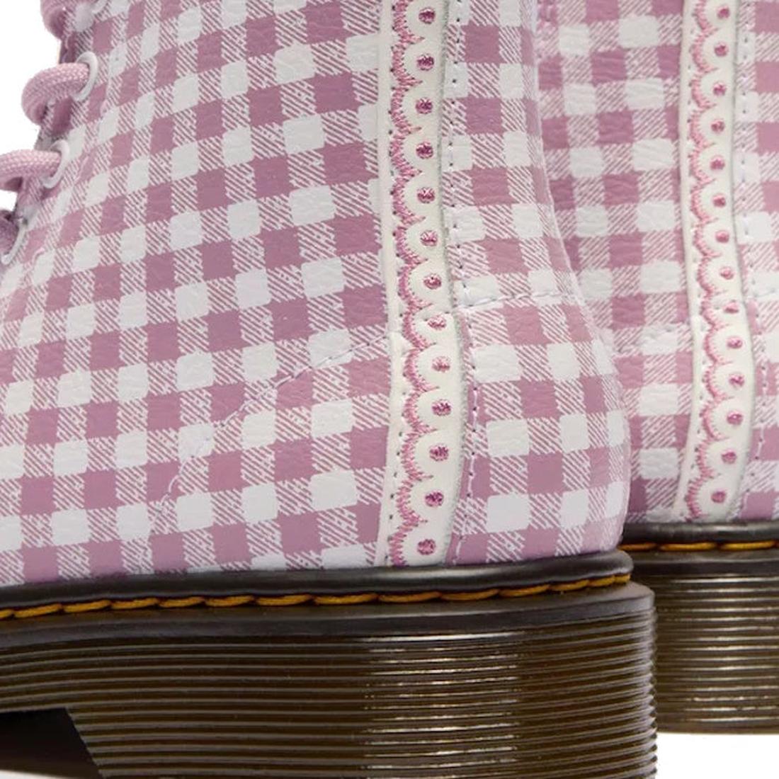 Close-up of the Dr Martens kids 1460 J Juniors Gingham Pink Lace Up Boot with zip, showing pink gingham pattern, decorative stitching, brown soles with yellow stitching, and classic 8-eye design., 50424, 50425, 50426, 190665779165, 190665779066, 190665779