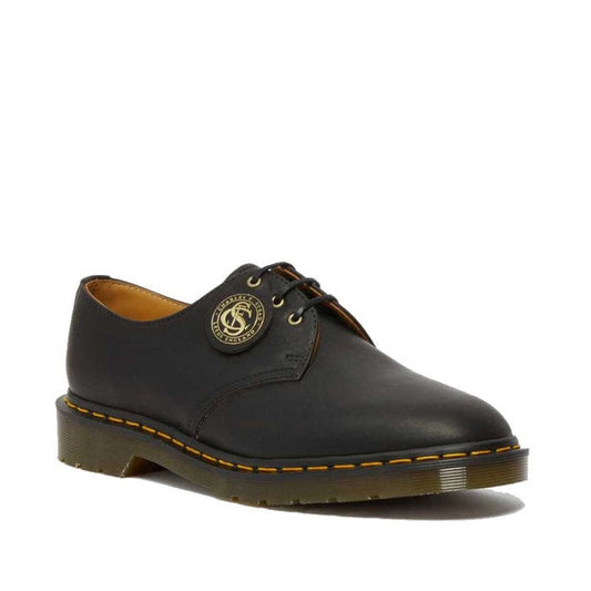 Image of right foot, side on of Dr Martens Made In England Oil Leather 1461 3 Eye Shoes-Foot Forward Shoes