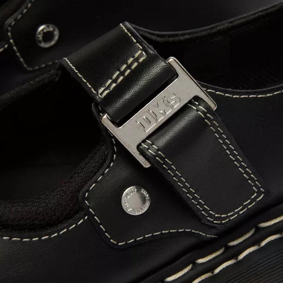 Dr Martens Women's Mary Jane WDS Bex: Classic black leather shoe with white stitching, easy buckle closure, sturdy sole, and rivet detail.  ksnz, 190665785807, 190665785814, 190665785821, 190665785845, 190665785869