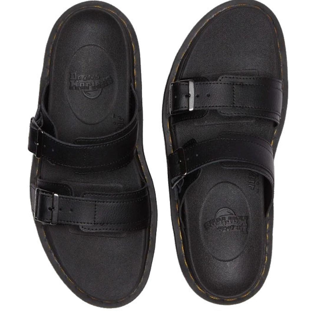 A pair of Dr Martens Myles Black slides in Athena leather top down view. Showing the back moulded sole, yellow stitching around the sole and 2 straps across the top of the foot with buckles.,
190665653779,
190665653786,
190665653793,
190665653816,
1906656
