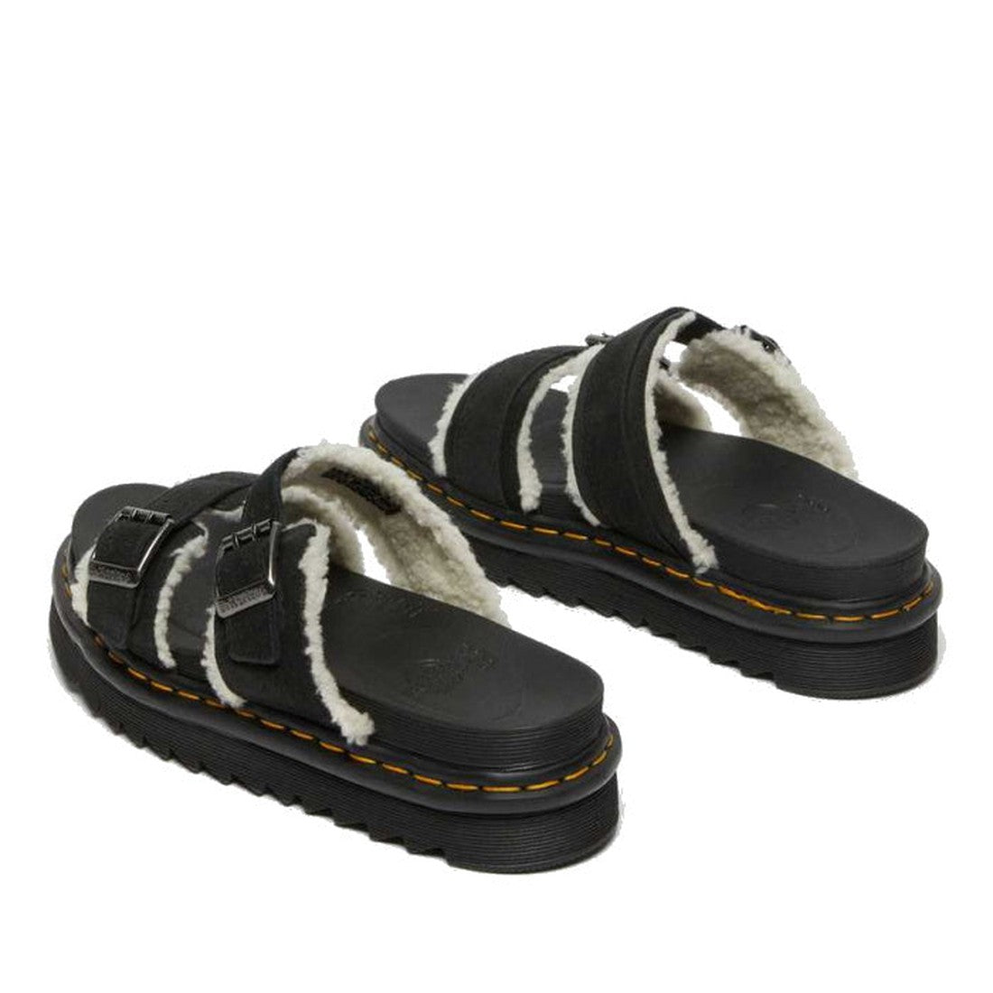 Dr Martens - Myles Black Suede Fur Lined Sandal features thick soles with yellow stitching, two adjustable buckle straps, and visible faux fur lining around the edges and straps., 25879, 25880, 190665493030, 190665493047, 25883, 190665493061, 190665493078