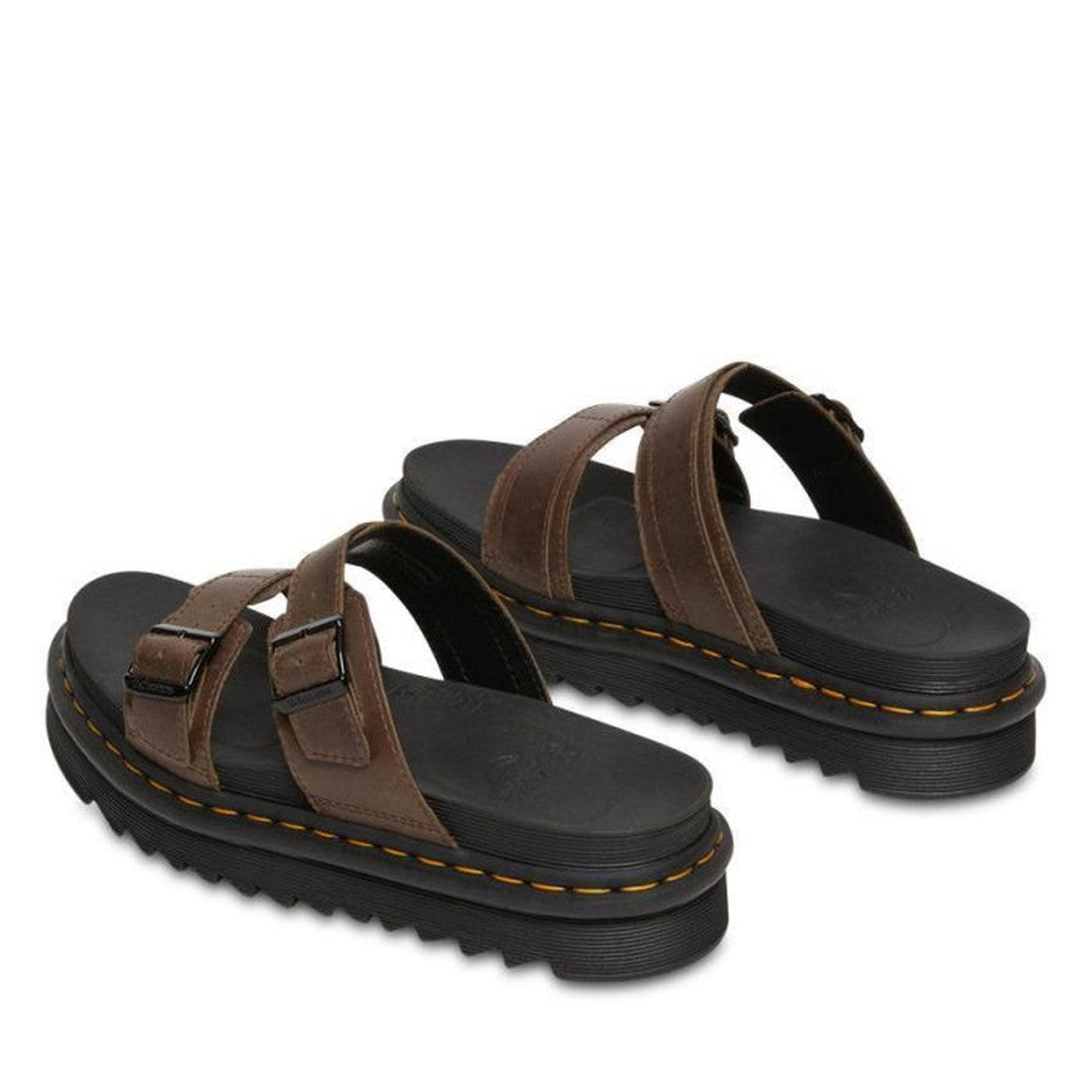 The Dr Martens Myles Dark Brown Oiled Illusion Sandal features brown leather, two adjustable buckle straps, Goodyear-welted construction, chunky black lightweight ripple soles, and distinctive yellow stitching., 26562, 190665523188, 190665523195, 19066552