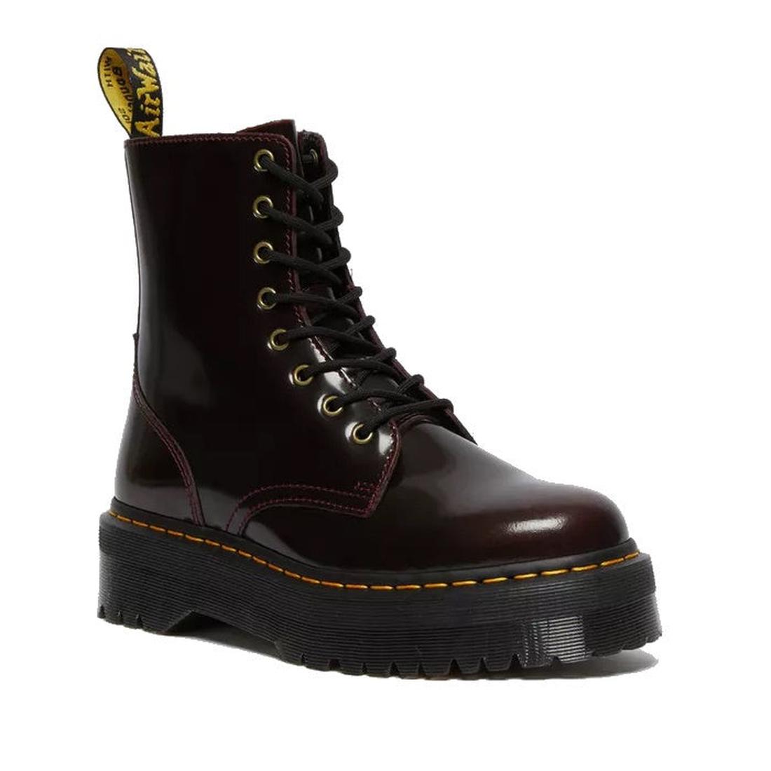 A glossy, cherry red Arcadia leather Dr. Martens Jadon 8-Up boot featuring yellow stitching, a chunky black platform sole, and a signature yellow AirWair pull tab at the heel.