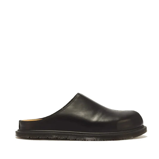 A Dr Martens San Mule Clog in black New Orleans leather, a slip-on mule with minimal detailing, closed toe and open heel, displayed in profile on a white background.