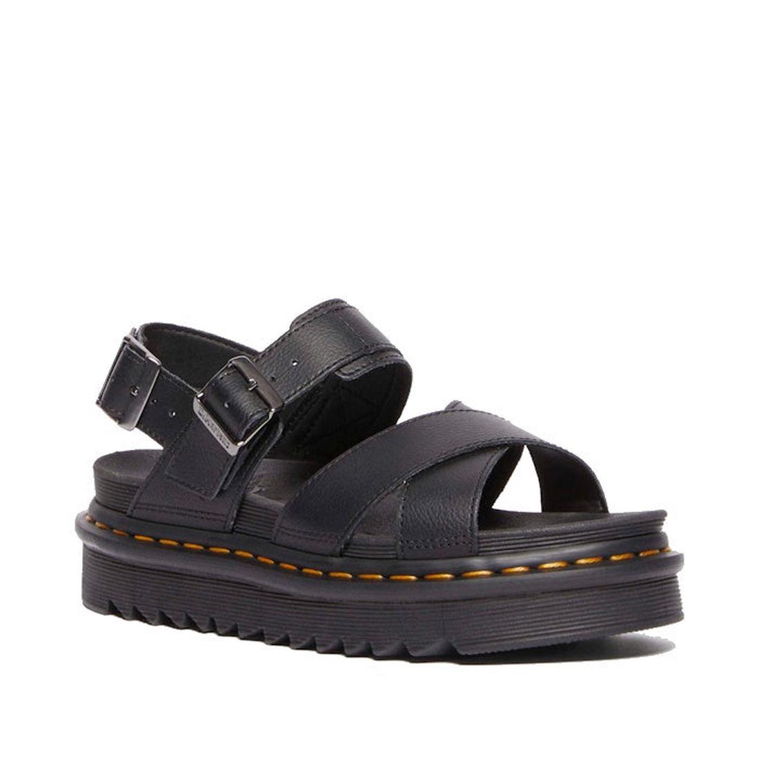 The Dr Martens Voss II Cross Strap Sandal in Athena Black features a thick sole, crisscross front straps, an ankle buckle strap, and signature yellow stitching—lightweight and perfect for everyday summer wear. Displayed on a white background., 19066572607