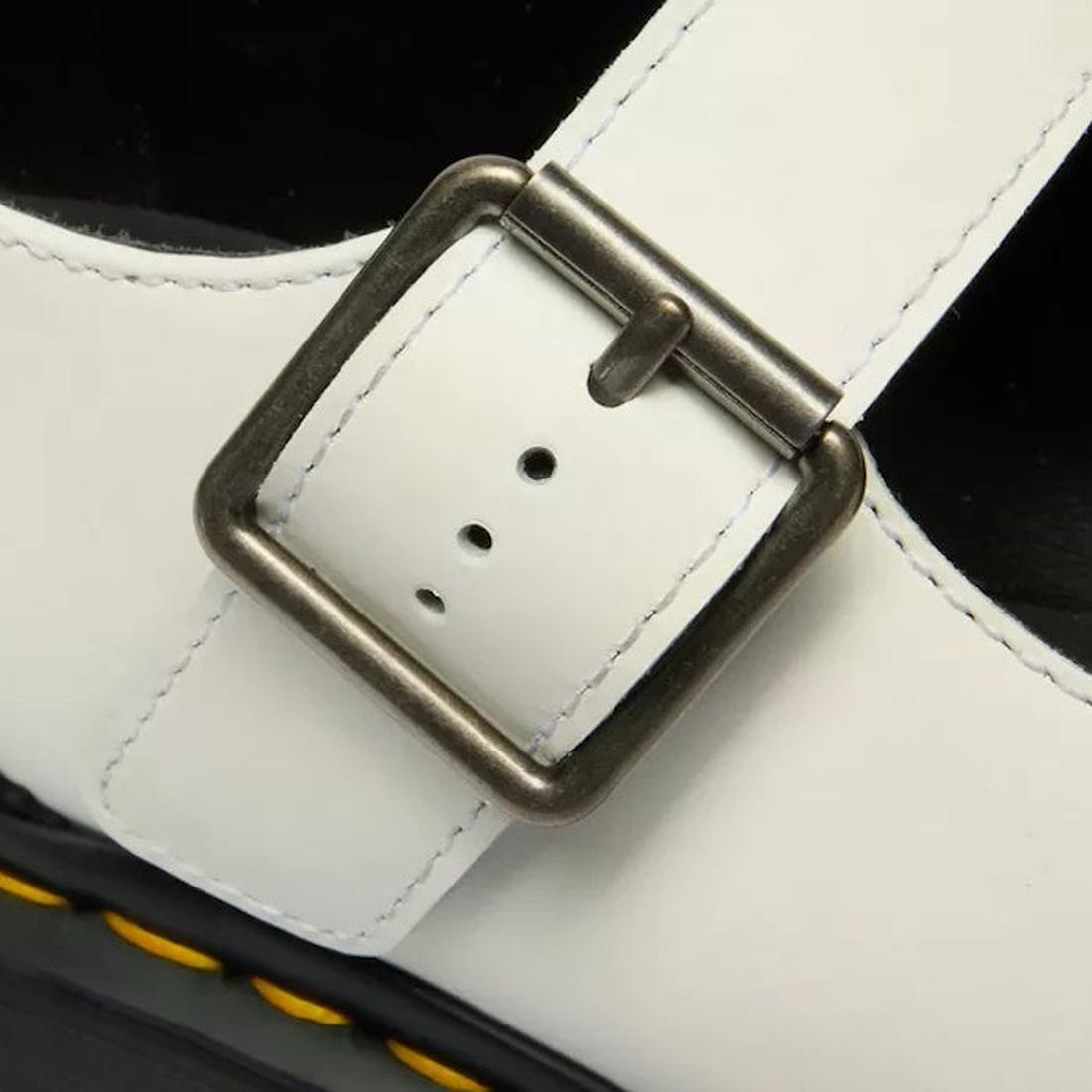 Dr Martens Women's Mary Jane BW Black + White shoe with white leather strap, silver buckle closure, sturdy sole, and bright yellow stitching.  ksnz, 190665785333, 190665785340, 190665785364