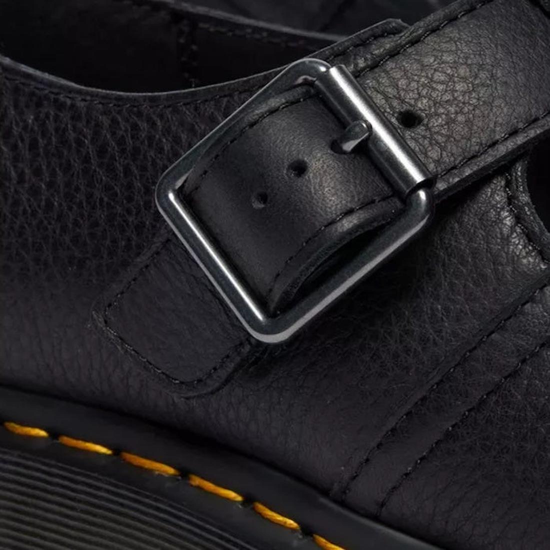 Close-up of the buckle and leather detail of Dr Martens Polley T Bar leather shoe with a buckle .,
190665740530,
190665740547,
190665740561,, 46179, 46180, 190665740530, 190665740547, 190665740561, 46185, 46186