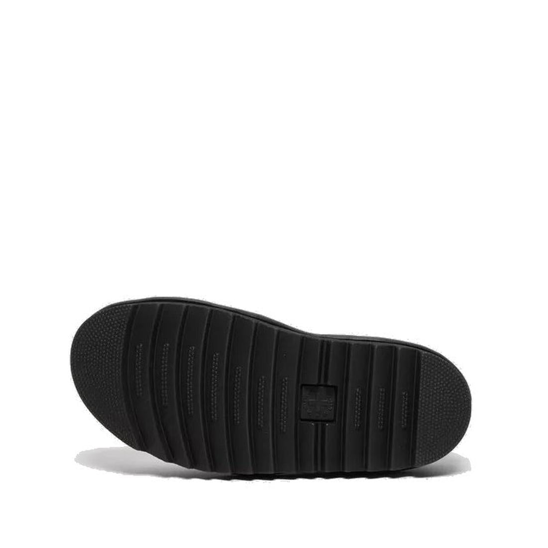 Dr Martens Voss II Cross Strap Sandal in white, with a cross-strap design, sturdy grooved sole, and textured toe and heel.  ksnz, 190665404579, 190665404586, 190665404593, 190665404616, 190665404623, 190665404630