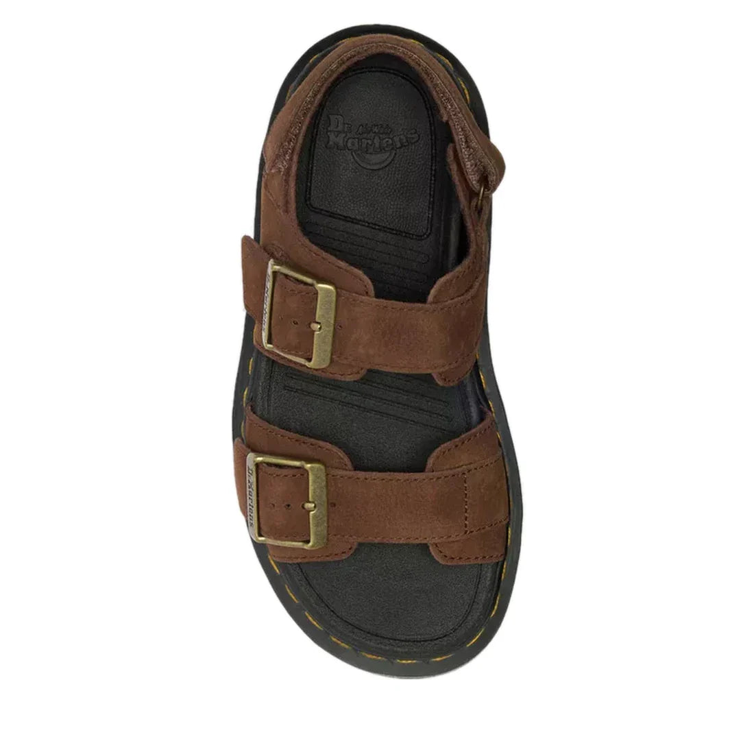 The Dr Martens Zebzag Sepia Brown Nubuck 2 Strap Sandal features milled nubuck leather, two large brass buckles, visible yellow stitching around a black sole, and a water-resistant design. Shown from a top-down view., 190665790603, 190665790610, 190665790