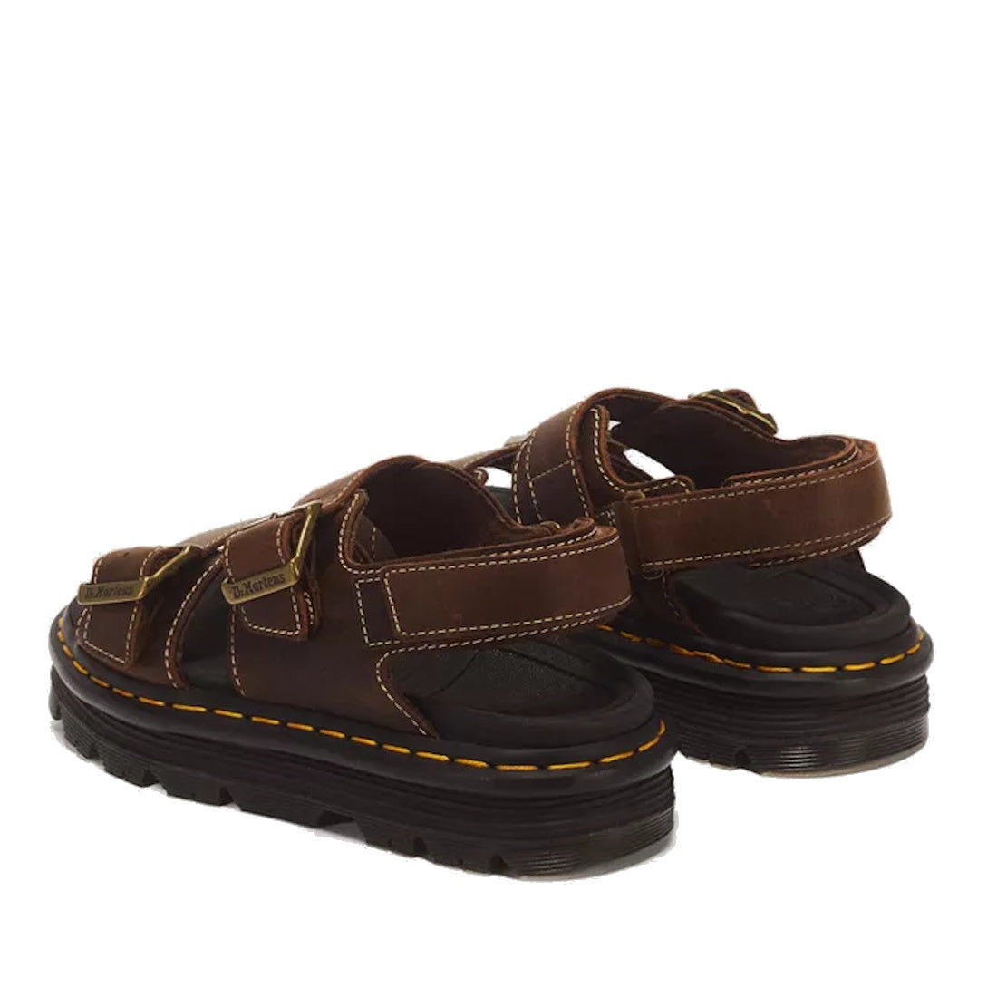 A pair of Dr Martens Zebzag Crazy Horse Brown 2 Strap Sandals with adjustable straps, yellow stitching on thick air-cushioned soles, and open heels, shown from the back and side., 52549, 190665818604, 190665818611, 190665818635, 52553, 52554, 190665818598