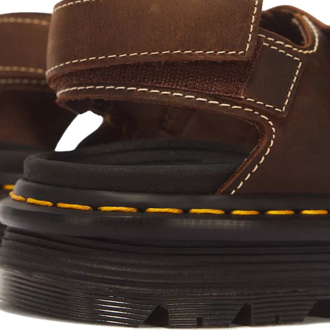 Close-up of the Dr Martens Zebzag Crazy Horse Brown 2 Strap Sandal, showcasing brown leather, white stitching, a thick black air-cushioned platform sole, and bold yellow stitching around the edge., 52549, 190665818604, 190665818611, 190665818635, 52553, 5