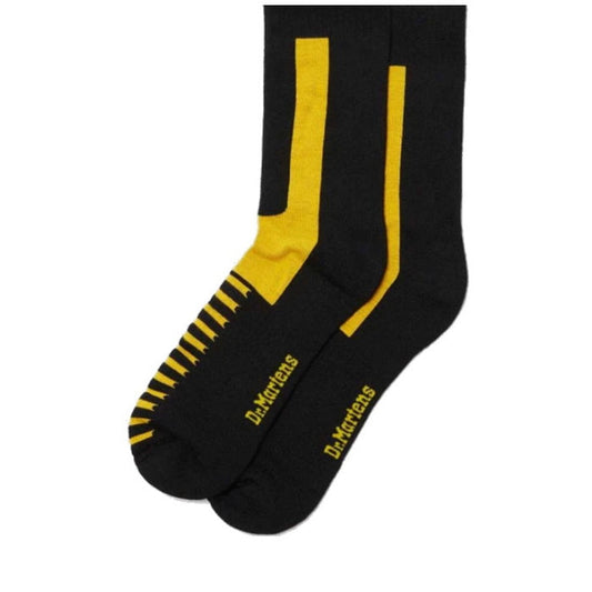 Image of right foot, side on of Dr Martens Socks Double Doc Sock Unisex Black Yellow-Foot Forward Shoes