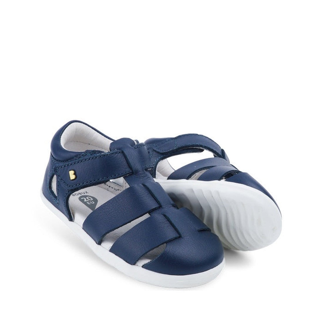 Bobux Step Up US Tidal Navy Closed Toe Sandal 732503: toddler sandals in navy with quickdry leather, white soles, Velcro straps, and cutout sides, displayed on a white background.