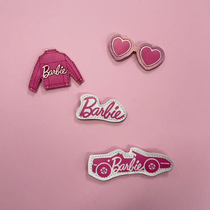 Show off your style with EMU Kids Wallaby Mini Play Barbie Pink: four customizable Barbie-themed patches—a pink jacket, heart sunglasses, the Barbie logo, and a convertible—all on a pink background. Ideal for fans who love personalized accessories!., 9330