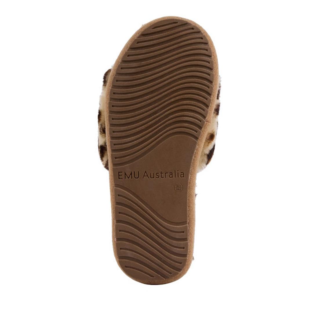 The image shows the sole of the EMU Women's Mckay Leopard Print Sheepskin Scuff Slipper Slide, featuring a wavy tread pattern, "EMU Australia" embossed in the center, furry edges, and a cushioned foam midsole for comfort., 47435, 9330071979303, 9330071979