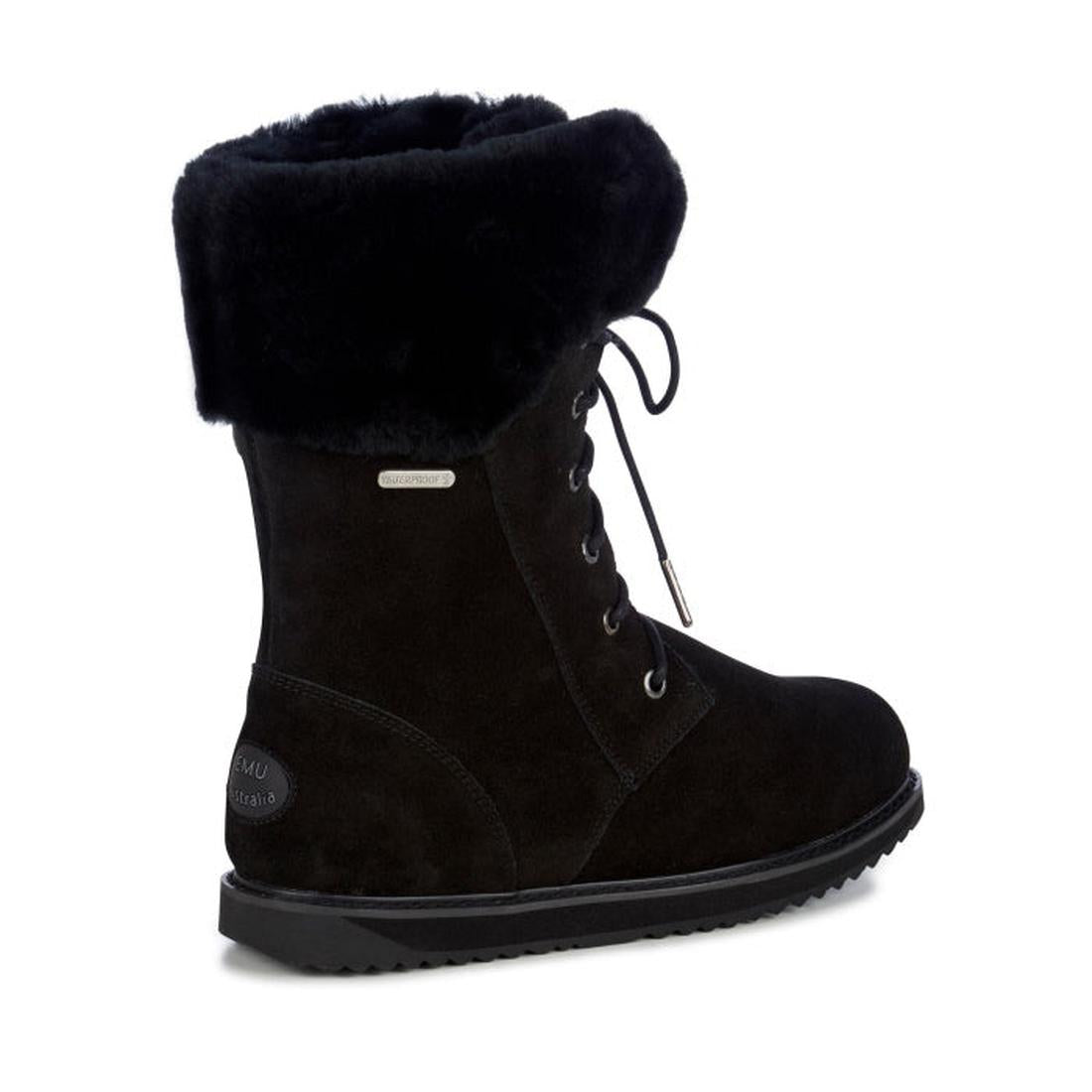 The Emu Women's Shoreline Sheepskin WATERPROOF Boot in black features suede, a lace-up front, thick folded fur collar, flat rubber sole, branded heel label, metal tag near the top, and is inspired by classic Emu sheepskin boots., 9330071604441, 9330071604