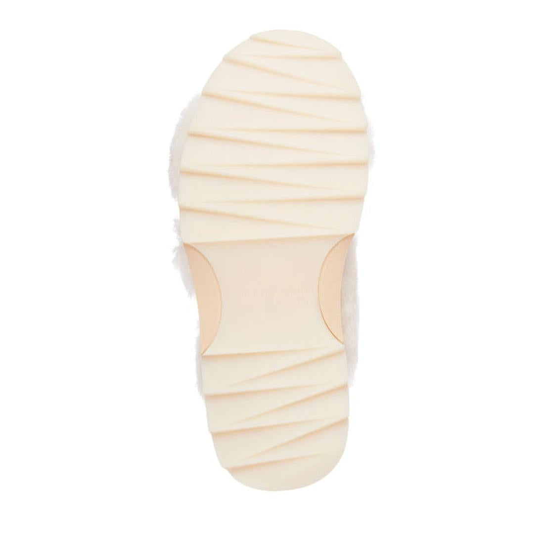 EMU NZ Women's Wobbegong Natural Sheepskin Scuff Slipper in light, cozy tones with grippy textured sole and comfy slip-on fit.  ksnz