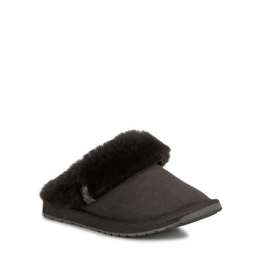 The EMU Women's Eden Platinum Sheepskin Black Scuff Slipper is a cozy, Australian-made black slip-on with plush sheepskin lining and a flat rubber sole—perfect for comfort seekers. Displayed angled on a white background.