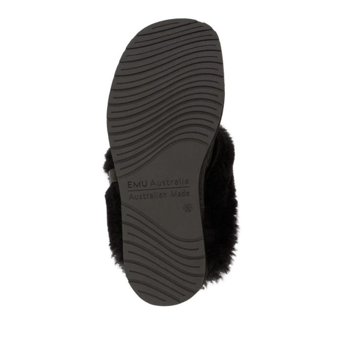 The image shows the sole of the EMU Women's Eden Platinum Sheepskin Black Scuff Slipper, featuring a textured, wavy tread pattern and “EMU Australia, Australian Made” embossed on the bottom., 9330071275504, 9330071275511, 9330071275528, 9330071275535, 933