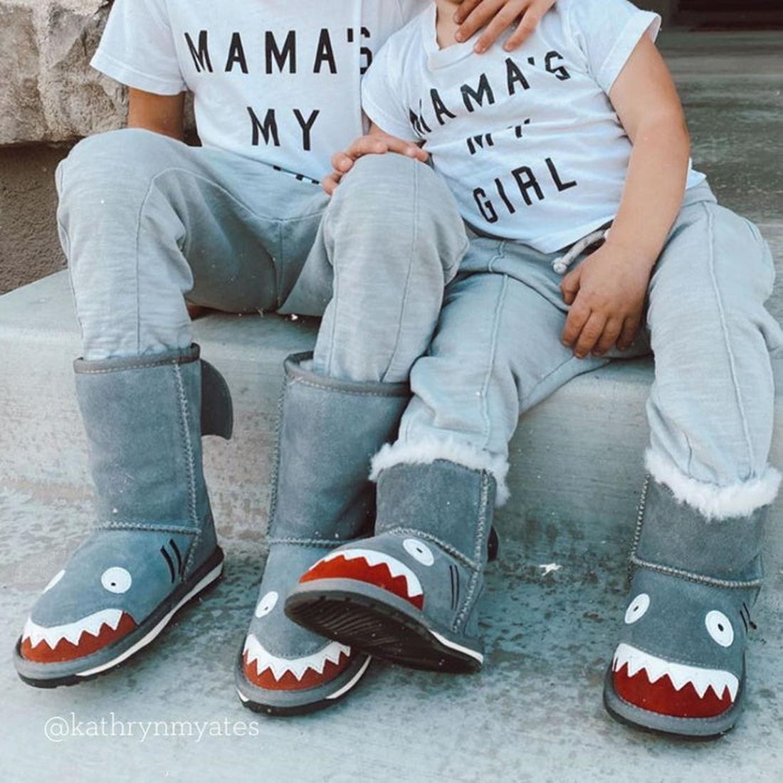 Two kids on steps in EMU NZ Kids Creatures Grey Putty Shark Wool Boots with grippy soles, side zip closure, and soft Merino wool.  ksnz