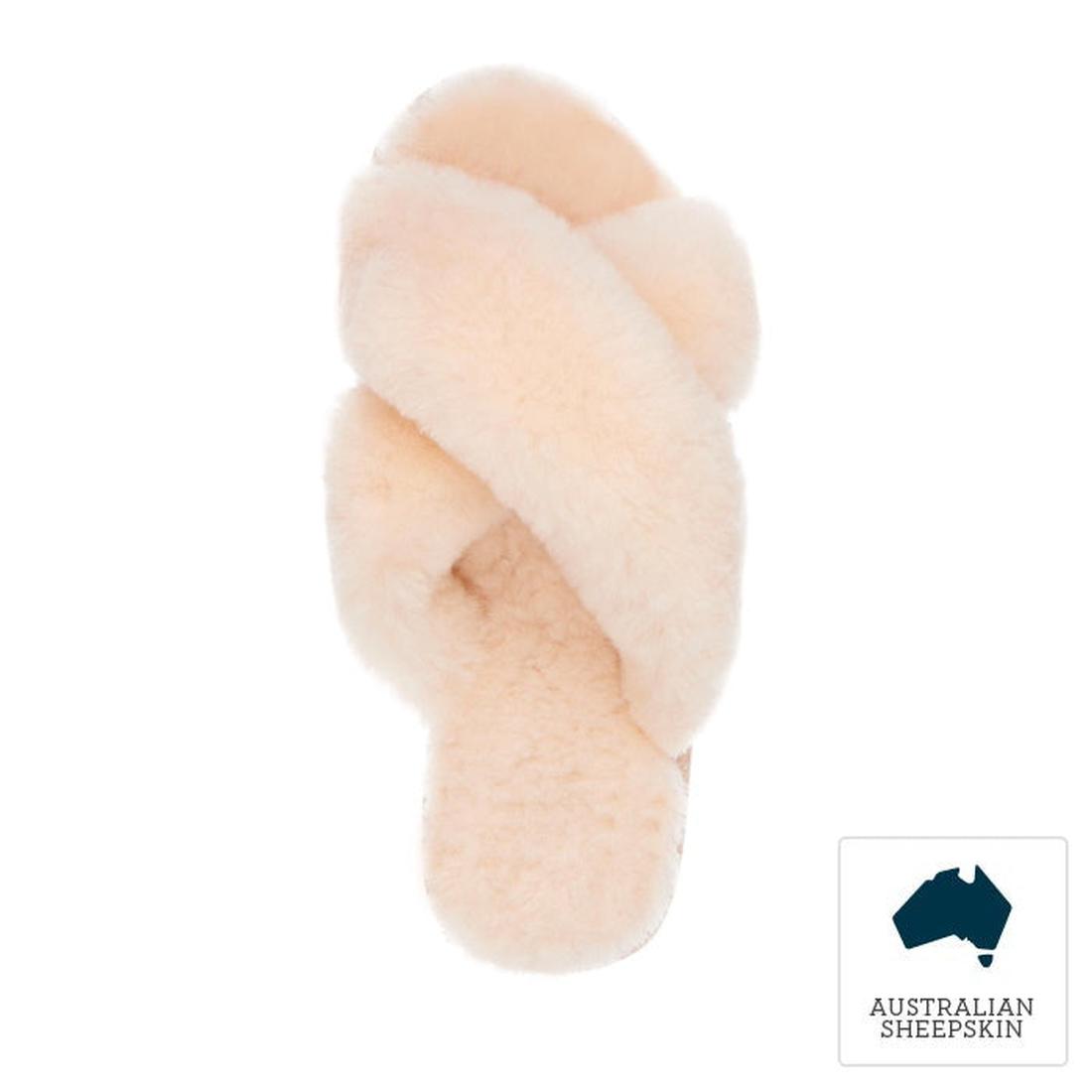 The EMU Women's Mayberry Natural Luxurious Sheepskin Scuff Slipper features soft, light pink sheepskin and a crisscross design. A blue map of Australia labeled "AUSTRALIAN SHEEPSKIN" highlights the slipper's cozy Australian origin., 9330071670002, 9330071