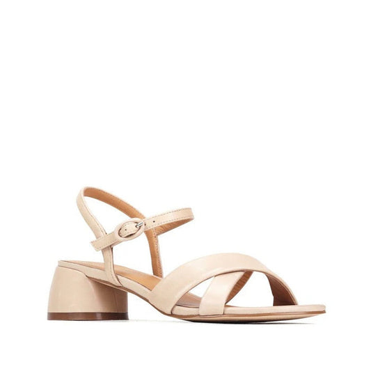 EOS Womens Fiora Strappy Leather Sandal in nude: comfy block heel, secure ankle buckle, soft leather straps. Shown on white background.  ksnz