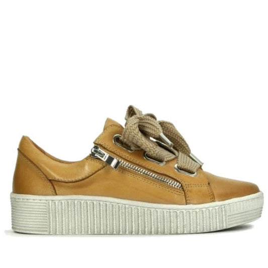 The EOS Jovi Leather Trainer features tan Italian Aniline leather, thick tan laces, a silver zip, and a white textured rubber sole—shown side profile on a white background. Perfect comfortable casual sneakers.