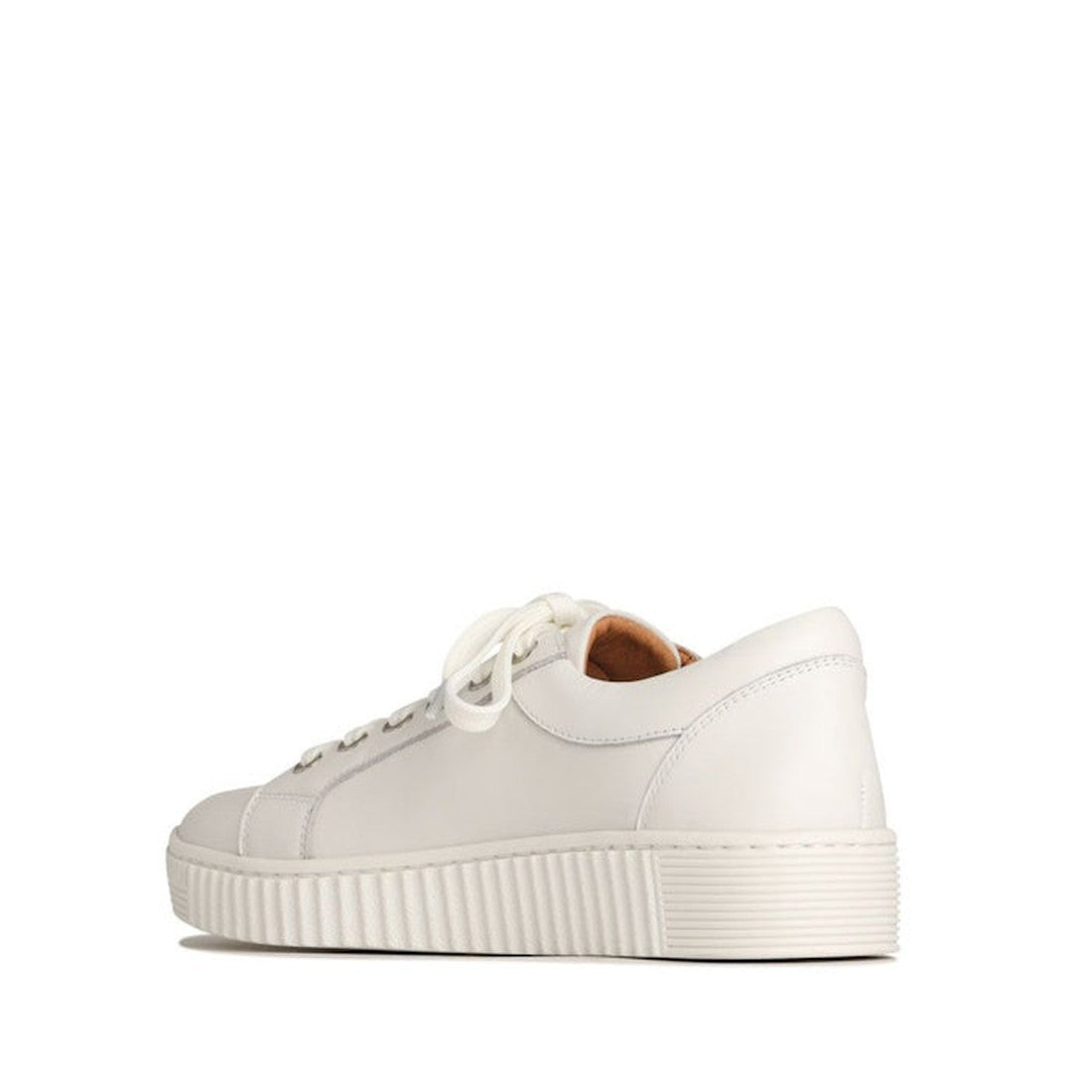 The EOS Joyce Leather Trainer is a white low-top Italian Aniline leather sneaker with white laces, side zip, and a textured rubber sole, shown from a rear side angle on a plain white background., 9321191044484, 9321191044491, 9321191044507, 9321191044514,