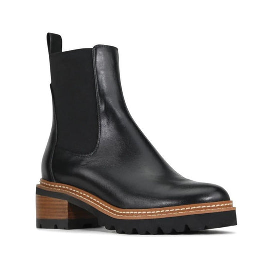 EOS Linear women’s boot in Black leather with side gussets, block heel, and lugged sole. Side View of Right Foot 