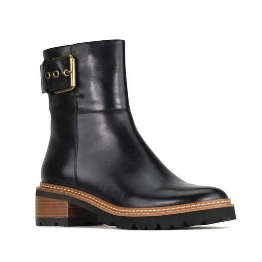 EOS Lineman Black Women's Leather Boot: sturdy lace-up combat boot with chunky heel, durable treaded sole, and shiny gold buckle.  ksnz
