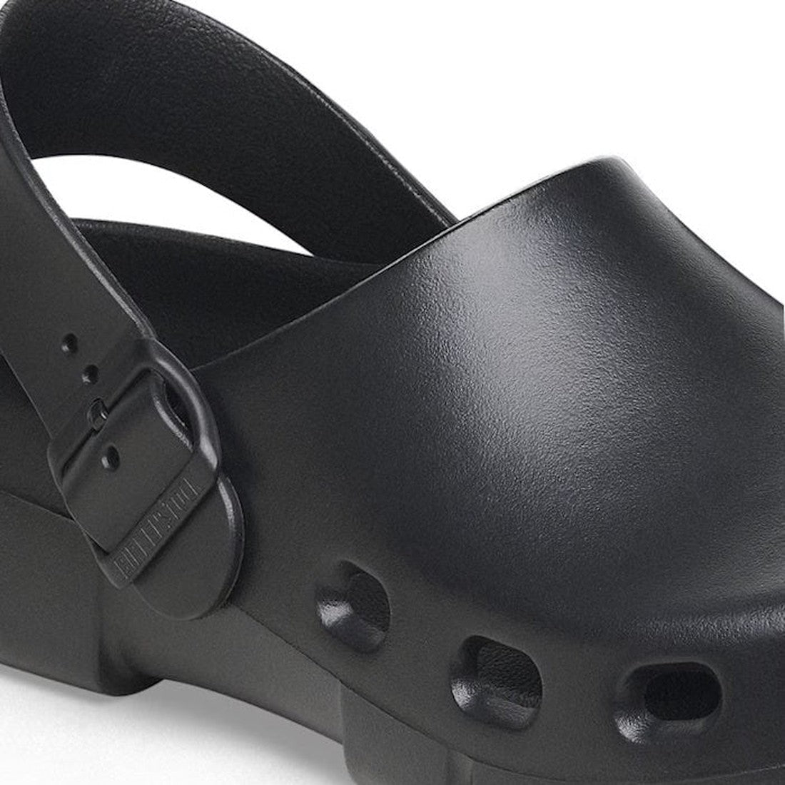 Close-up of the Birkenstock Birki Flow EVA Black Regular Width clog, featuring ventilation holes near the sole, adjustable strap, arch support, and a matte finish., 4066648424949, 4066648424987, 4066648425021, 4066648425069, 4066648425106, 4066648425144, 