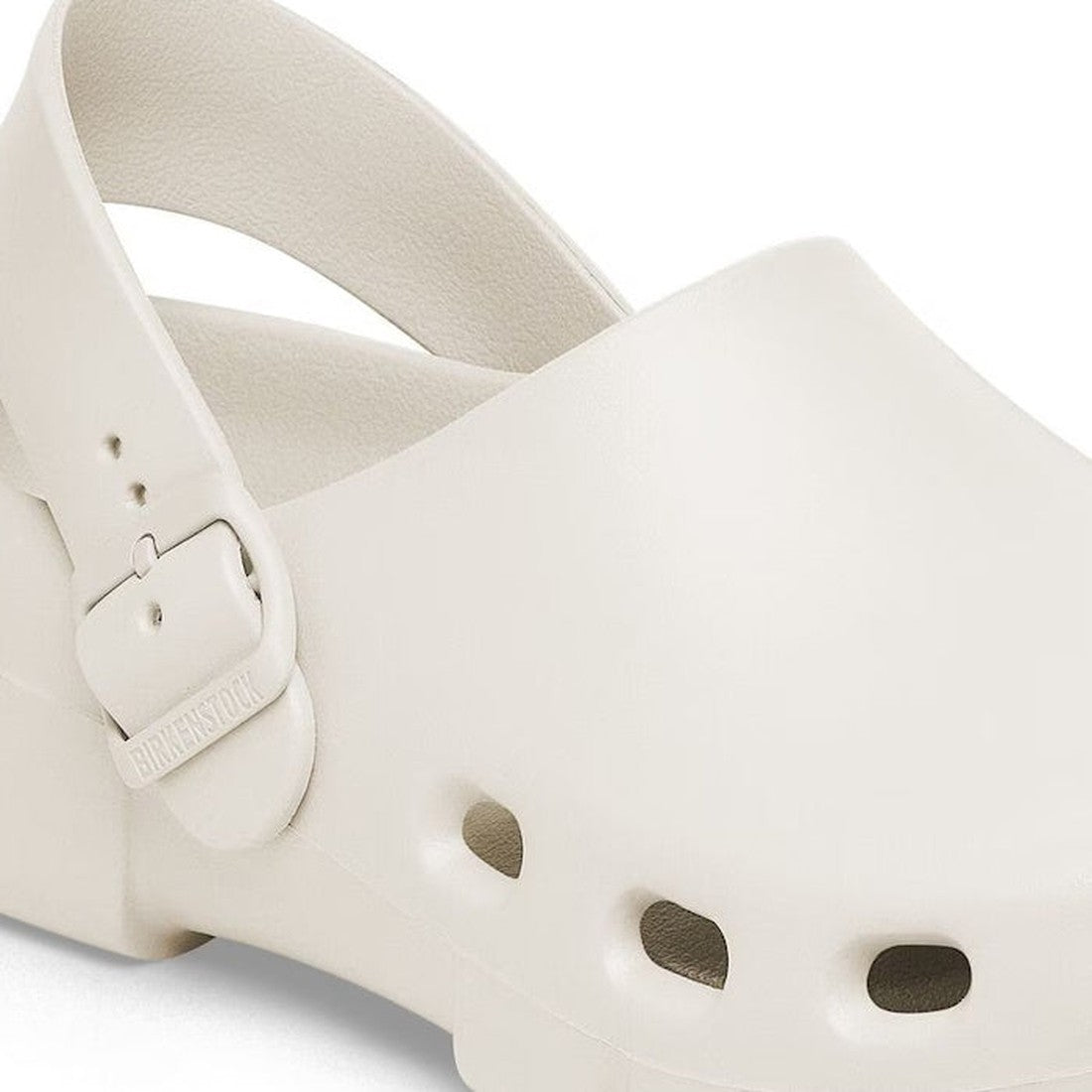 Close-up of the Birkenstock Birki Flow EVA EggShell (Regular Width) clog on a white background, showing its side buckle, back strap, ventilation holes, waterproof and washable design, and arch-supportive sole. Clearance item., 4066648439509, 4066648439547